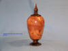 Afazalia burl bottle with Texas Ebony