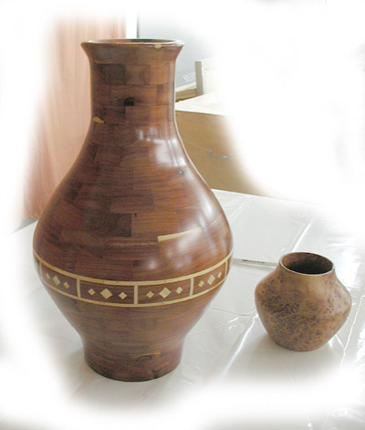 Bill Peace segmented vessel and Dale Lemons burl hollow form.